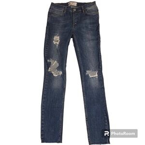 FP Free People size W 25 skinny ripped button fly stretch denim.